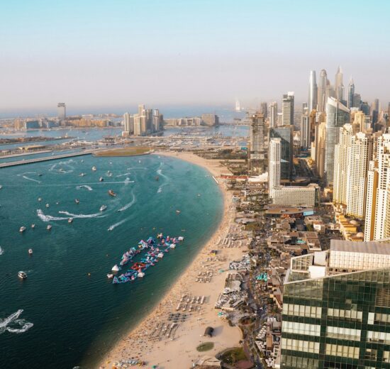 Aerial view of Dubai coastline with residential towers and apartment buildings