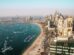 Aerial view of Dubai coastline with residential towers and apartment buildings