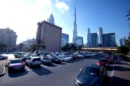 Cars parked in a designated public parking zone in Dubai