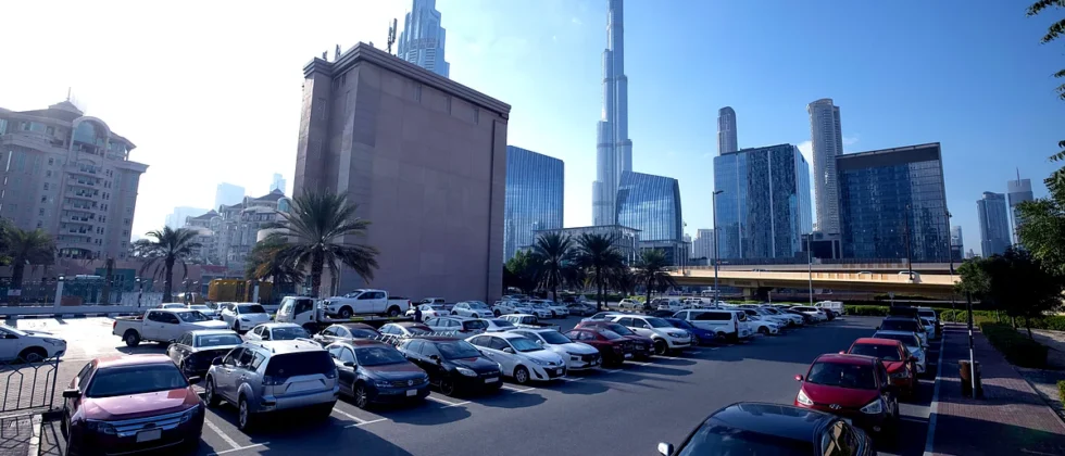 Cars parked in a designated public parking zone in Dubai