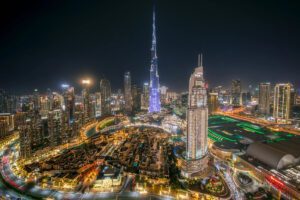 Dubai rental contracts: Downtown Dubai skyline at night with Burj Khalifa