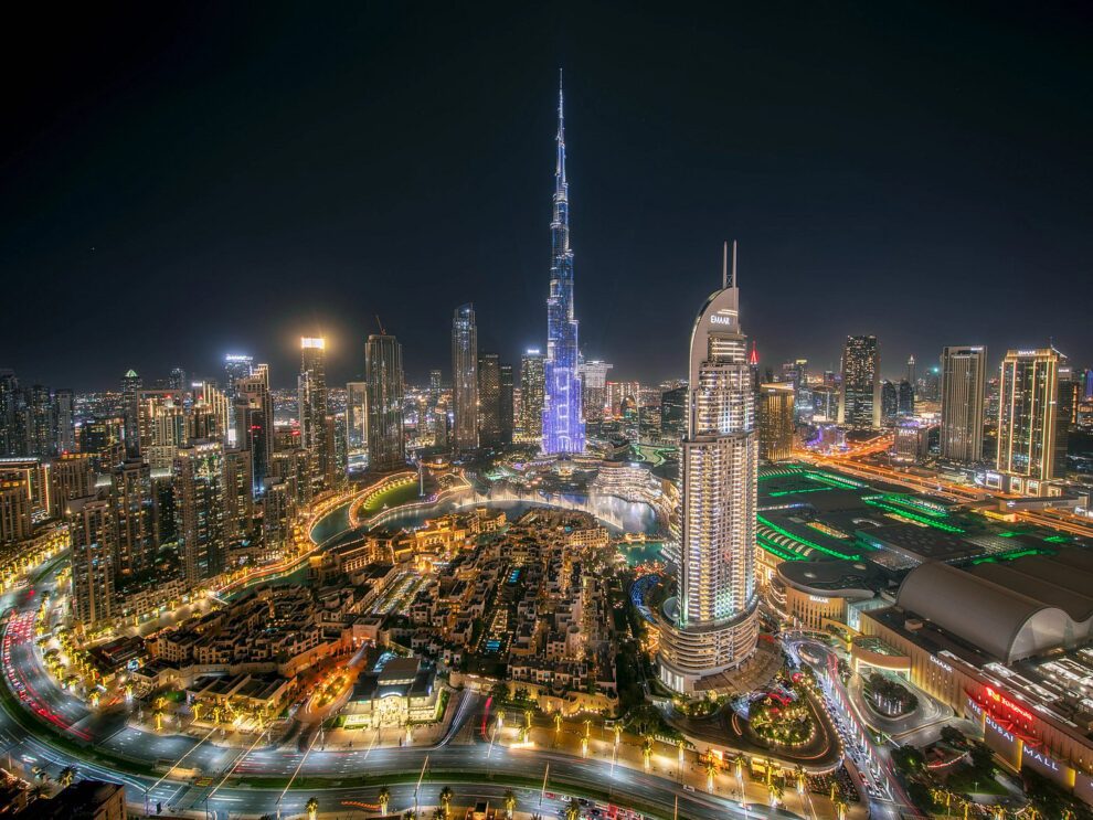 Dubai rental contracts: Downtown Dubai skyline at night with Burj Khalifa