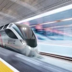 Etihad Rail train at a station platform ahead of the new Dubai Metro link