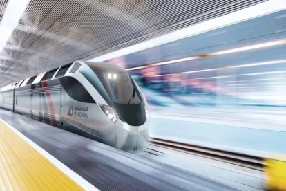 Etihad Rail train at a station platform ahead of the new Dubai Metro link