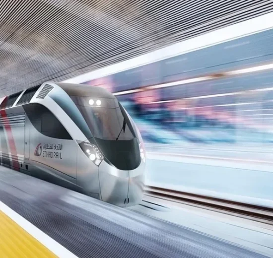 Etihad Rail train at a station platform ahead of the new Dubai Metro link