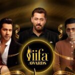 Bollywood stars celebrating at a press event