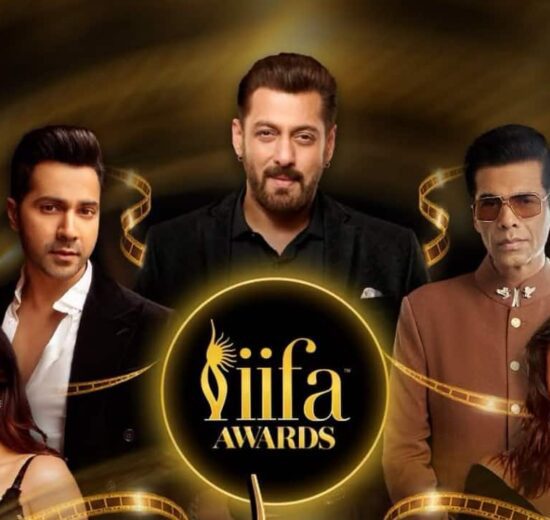 Bollywood stars celebrating at a press event