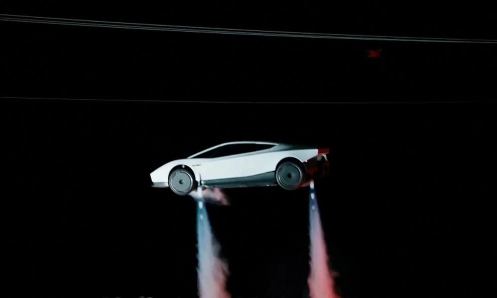White new Tesla Roadster airborne at night with cold-gas thrusters firing beneath the wheels