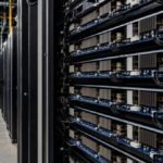 Server racks in a data center as SpaceX secures debt for AI chip expansion
