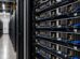 Server racks in a data center as SpaceX secures debt for AI chip expansion