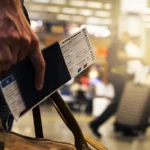 Passport and travel documents on a desk