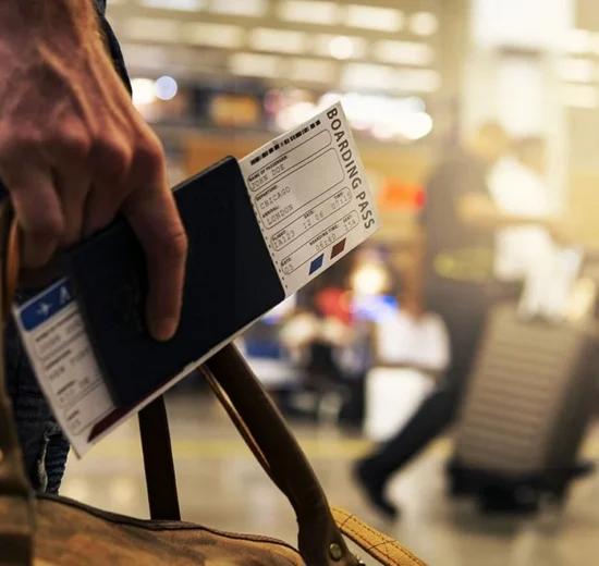Passport and travel documents on a desk