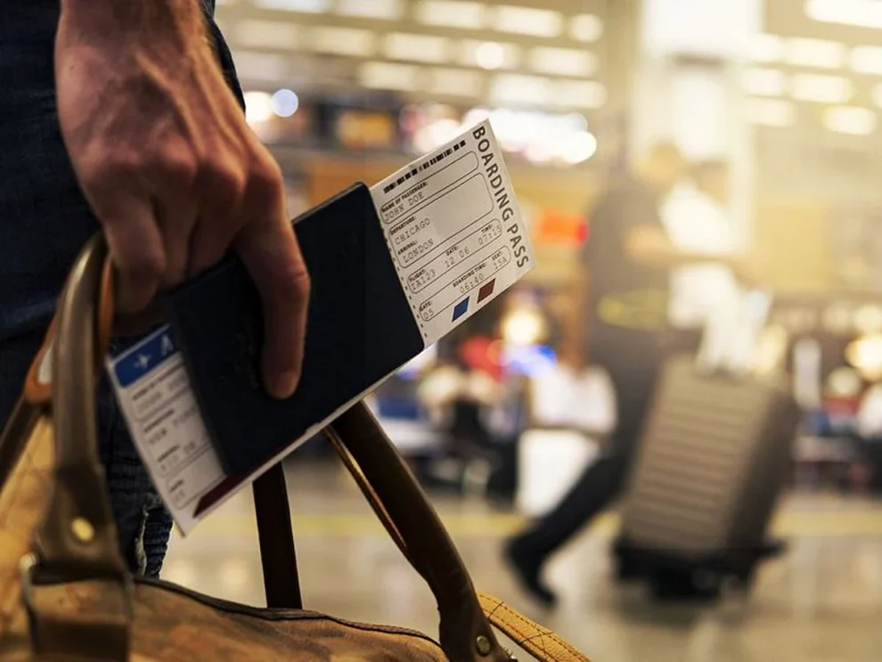 Passport and travel documents on a desk