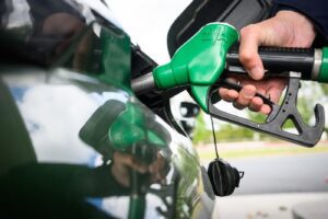 UAE petrol prices for November: driver refuelling a car at a petrol pump